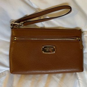 Gently used brown wristlet